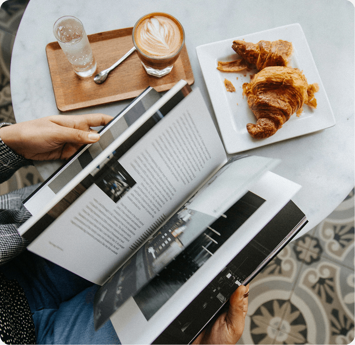 Coffee and croissant with a book