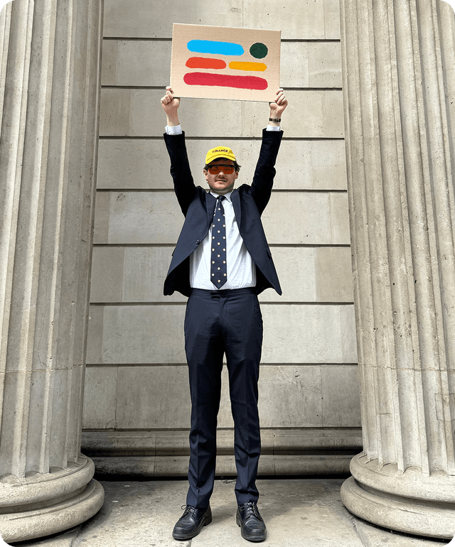 Team member with sign